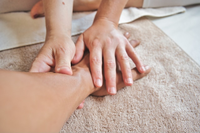 A hand being massaged