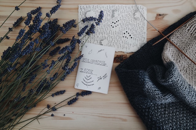 An example of a minizine, sitting next to a bunch of lavender