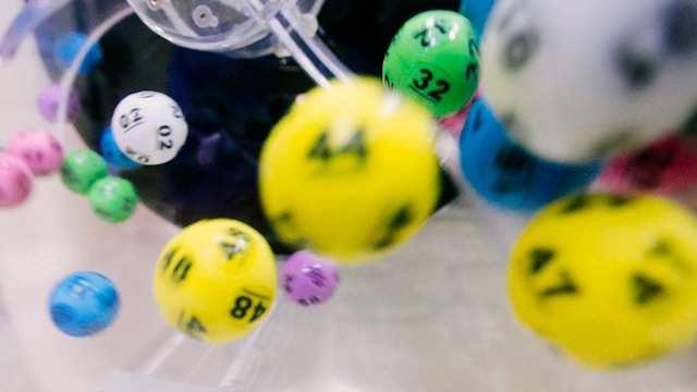 Colourful bingo balls in motion