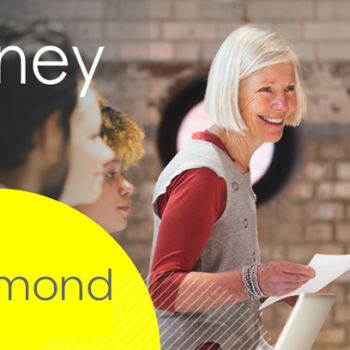 Crosslight - The Money Course - Richmond banner. Image show a group of people with the focus on a smiling woman holding a sheet of paper