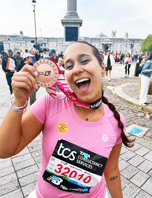 Georgia Griffiths celebrates with 2026 London Marathon medal