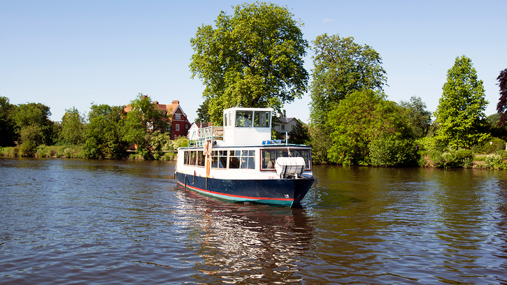 Photo of the Richmond Royale (of Turks fleet) on the river Thames on a sunny day
