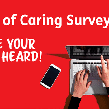 Carers UK - State of Caring 2026 survey. Image of hands typing on a laptop with a mobile phone and glasses to the side of the laptop. Image presented on a bright red background.