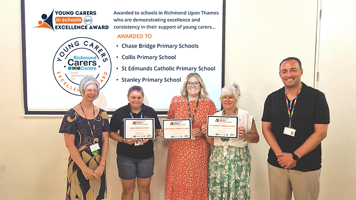 YCiS - Excellence Award 2026 banner. Image shows RCC and school staff holding certificates. The 5 staff members are standing in front of a projector screen displaying details of the award.